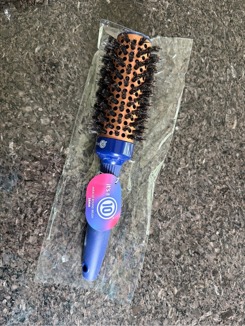 It's a 10 Blue Handle Round Vent Brush with Bronze Barrel